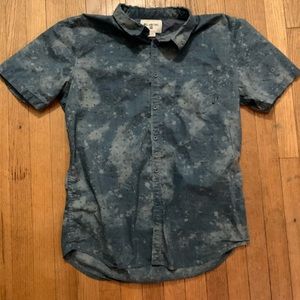 Billabong Acid Wash Button Up fits like a large.